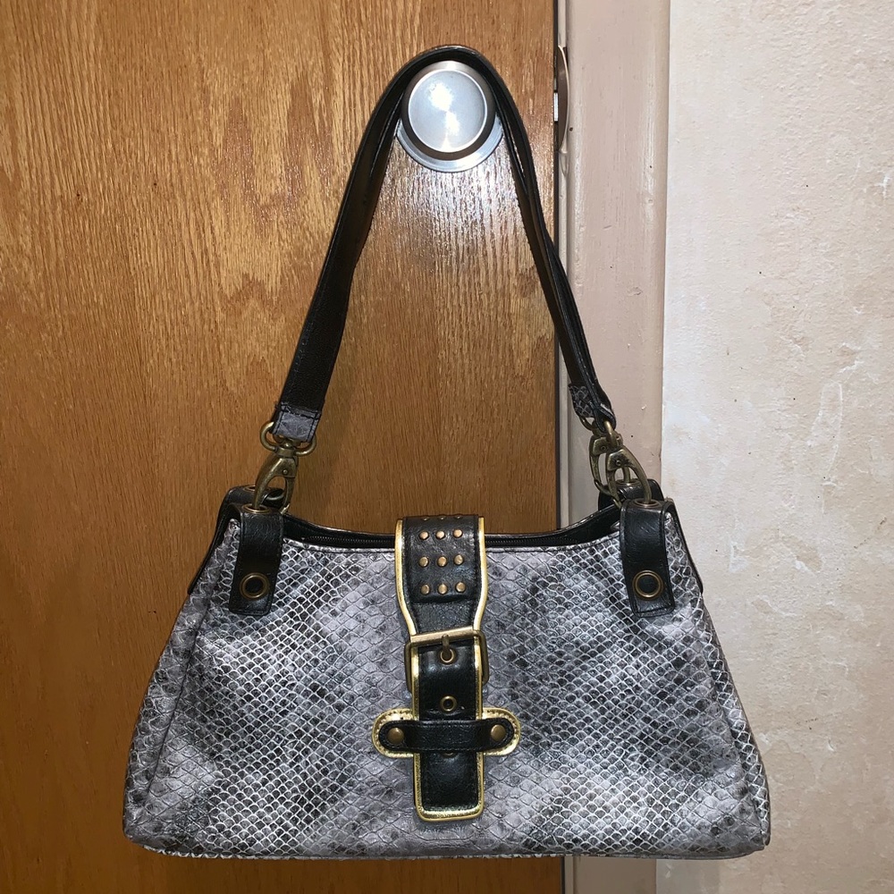 Snakeskin hand bag with magnetic belt closure